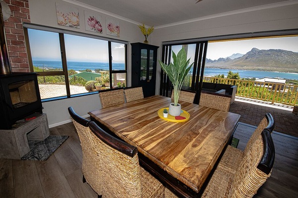 Dining Room with fireplace leading out to the terrace