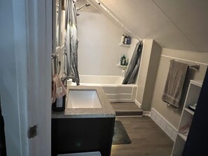 Bidet, towels, toilet paper