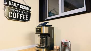 Mini-fridge, microwave, stovetop, cookware/dishes/utensils