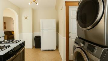 Mini-fridge, microwave, stovetop, cookware/dishes/utensils