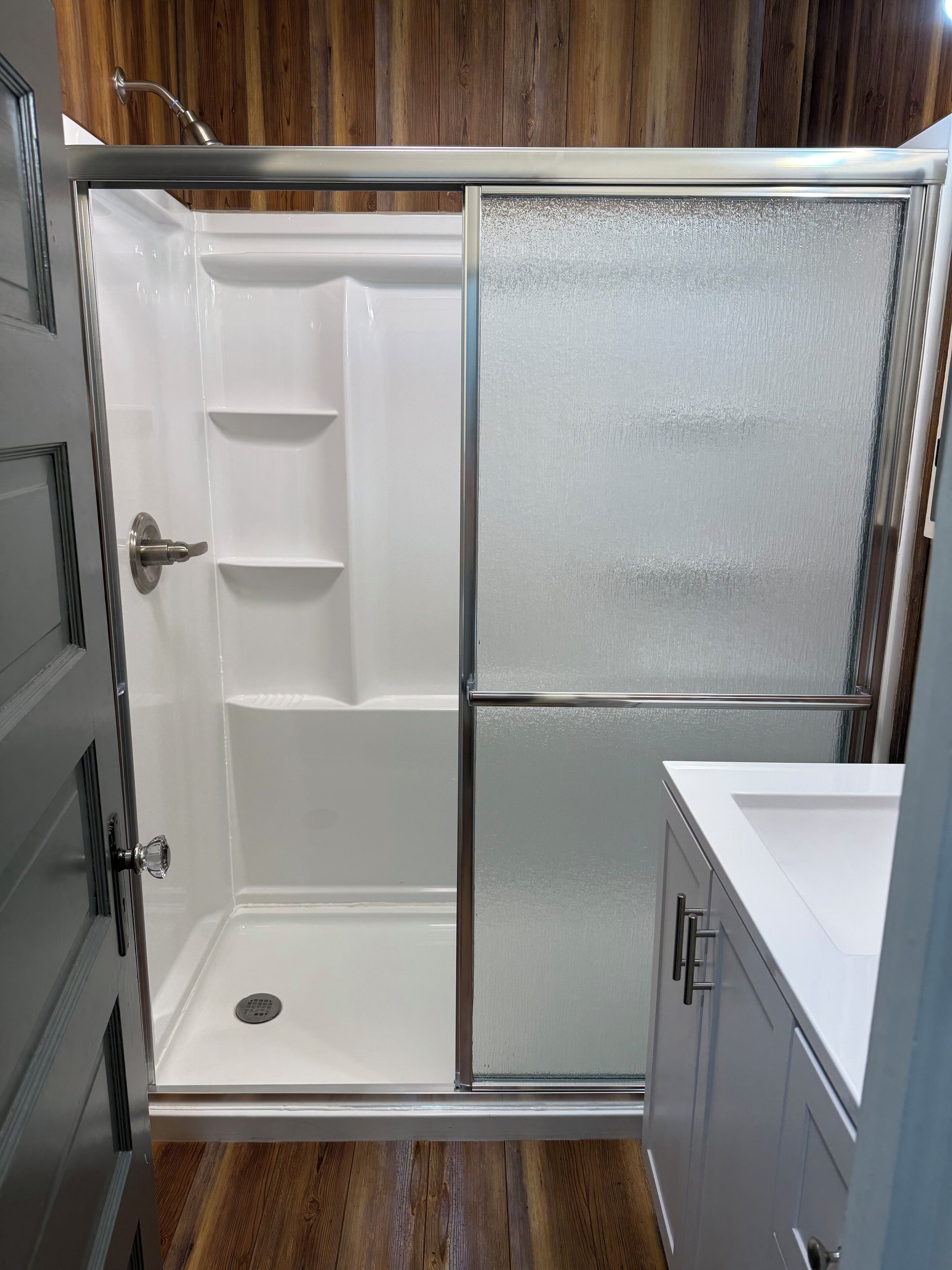 Shower, towels, soap, toilet paper