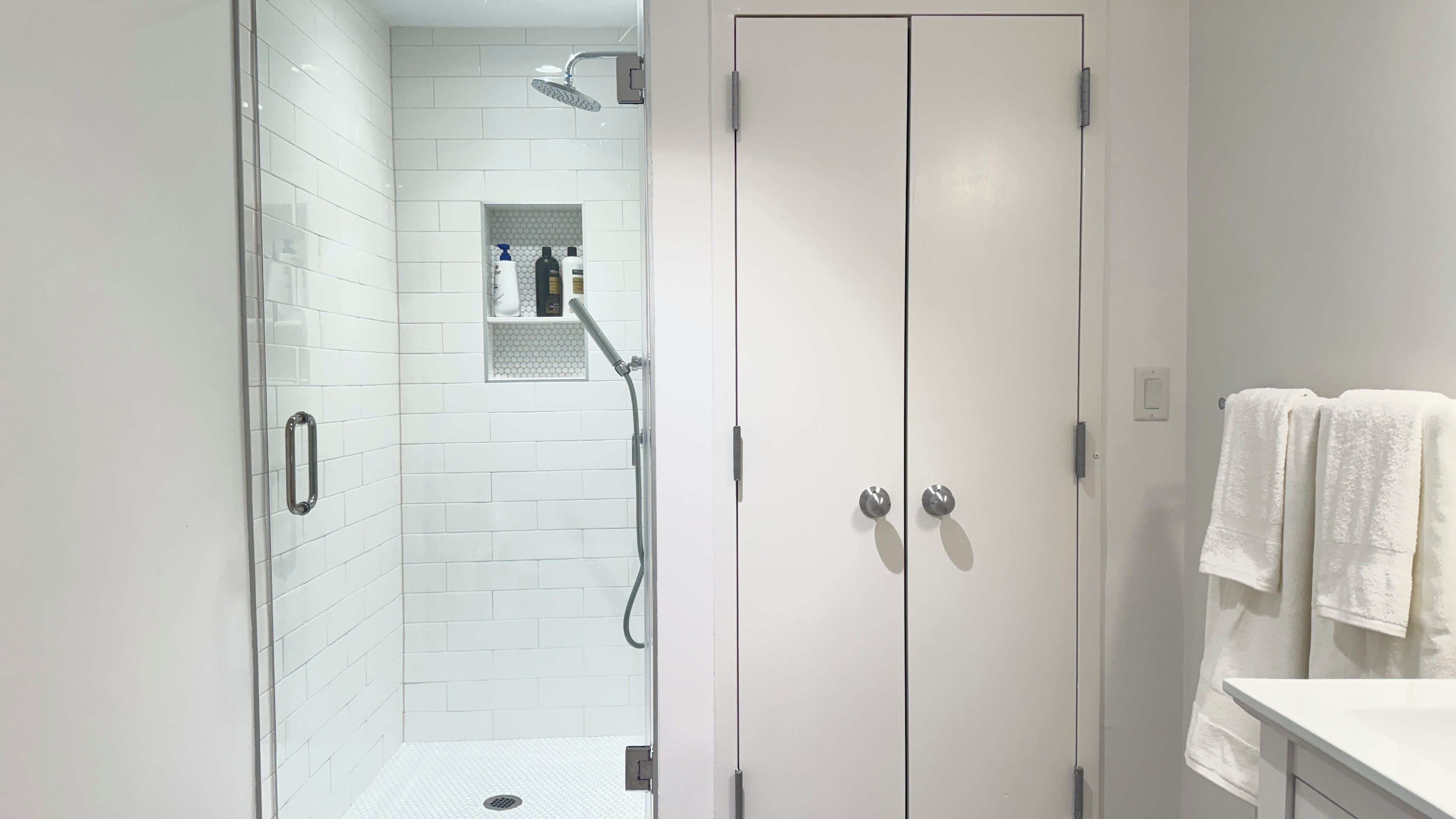Shower, hair dryer, towels, soap