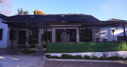 12-bedroom bed guest house in charming Bedfordvew with WiFi, AC