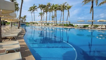 Outdoor pool, open 8:00 AM to 8:00 PM, pool umbrellas, pool loungers
