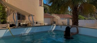 First floor apartment in a villa with terraces and swimming pool