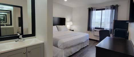 Desk, laptop workspace, WiFi (free), bed sheets