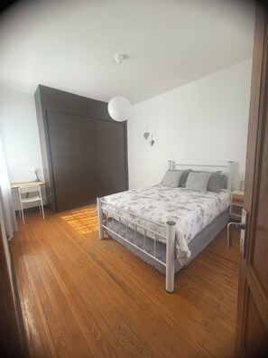 1 bedroom, desk, iron/ironing board, bed sheets