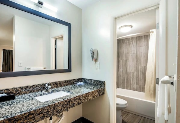 Basic Room, 2 Double Beds, Smoking | Bathroom | Hair dryer, towels, soap, shampoo