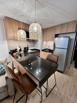 Apartment, City View | Private kitchen - Atractivo y moderno estudio en Clínica Las Condes (Santiago)