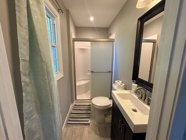 Shower, towels, soap, shampoo