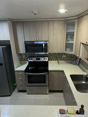 Fridge, microwave, oven, stovetop