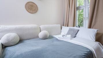 1 slaapkamer, een strijkplank/strijkijzer, wifi, beddengoed