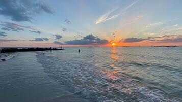 On the beach, sun loungers, beach towels