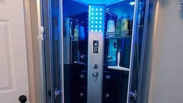 Shower, hair dryer, towels