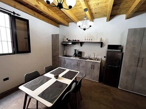 Fridge, microwave, stovetop, coffee/tea maker