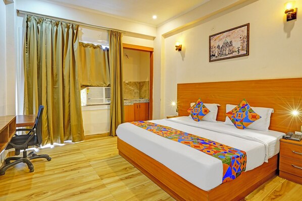 Deluxe kamer | Lakens van Egyptisch katoen, luxe beddengoed, een kluis op de kamer