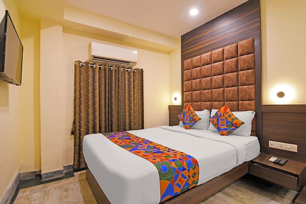 Deluxe kamer | Lakens van Egyptisch katoen, luxe beddengoed, een kluis op de kamer