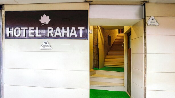 A hotel entrance with a sign reading "HOTEL RAHAT". - Fabhotel Rahat (Mumbai)