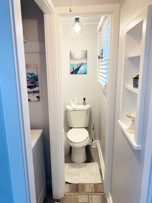Shower, hair dryer, towels, shampoo