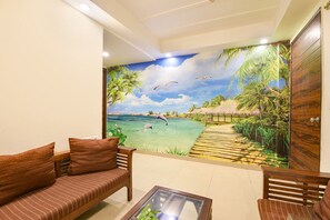 32-inch LCD TV with cable channels - RECONNECT SUITES (New Delhi)