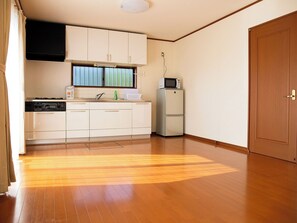 Fridge, microwave, stovetop, cookware/dishes/utensils