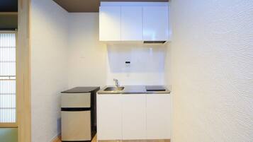 Fridge, microwave, cookware/dishes/utensils