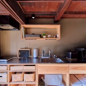 Fridge, microwave, stovetop, cookware/dishes/utensils