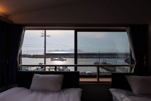 1 室のベッドルーム、デスク、WiFi (無料)、ベッドシーツ