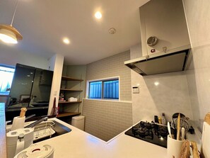 Fridge, microwave, cookware/dishes/utensils