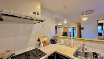 Fridge, microwave, cookware/dishes/utensils