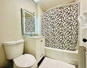 Hair dryer, towels, soap, toilet paper