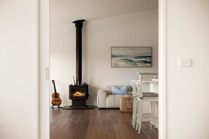 Fireplace in Dining Area  - Bella Haven | Panoramic Coastal Views | Sleeps 10 (Fairhaven)