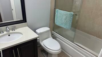 Hair dryer, towels, soap, shampoo