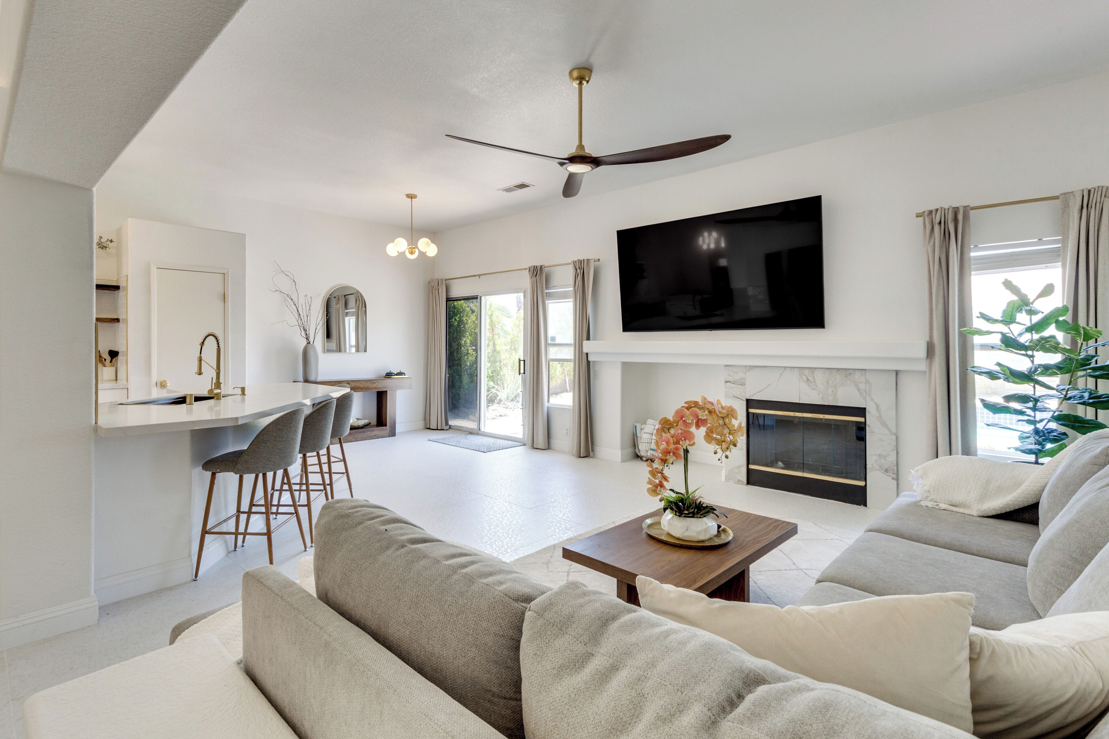 TV, fireplace, books