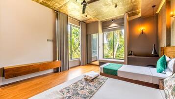 Habitación triple Deluxe | Espacio para trabajar con laptop y wifi gratis