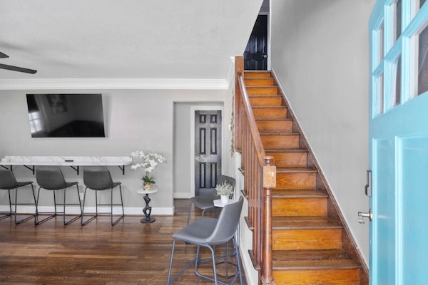 Several rooms offer the added elegance of original wood flooring to this hip abode!