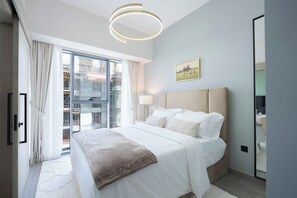 Deluxe Apartment, Balcony | Premium bedding, down comforters, memory foam beds, in-room safe