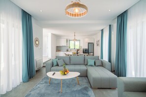 Deluxe-villa | Opholdsområde | Fladskærms-tv