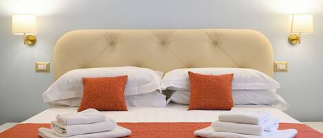 Superior Triple Room, City View | In-room safe, desk, laptop workspace, blackout drapes