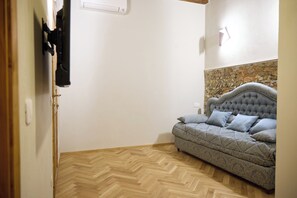 Family Quadruple Room | Living area