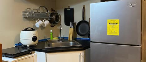 Fridge, microwave, cookware/dishes/utensils