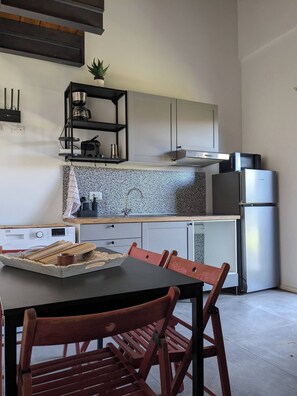 Fridge, microwave, cookware/dishes/utensils