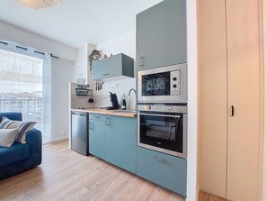 Fridge, microwave, oven, cookware/dishes/utensils