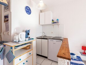 Fridge, microwave, cookware/dishes/utensils