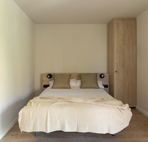 Apartment, 1 Bedroom | In-room safe, laptop workspace, blackout drapes, iron/ironing board