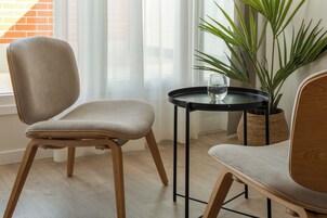 Studio, Balcony | Living area | 50-inch TV with cable channels