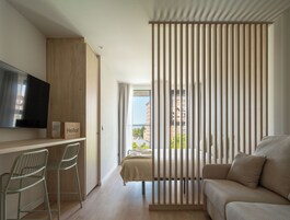 Studio | Living area | 50-inch TV with cable channels