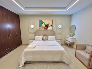 Superior Apartment, City View | Memory foam beds, in-room safe, laptop workspace, iron/ironing board