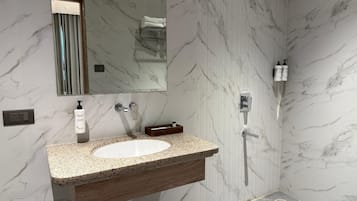 Superior Room | Bathroom | Shower, slippers, towels, soap