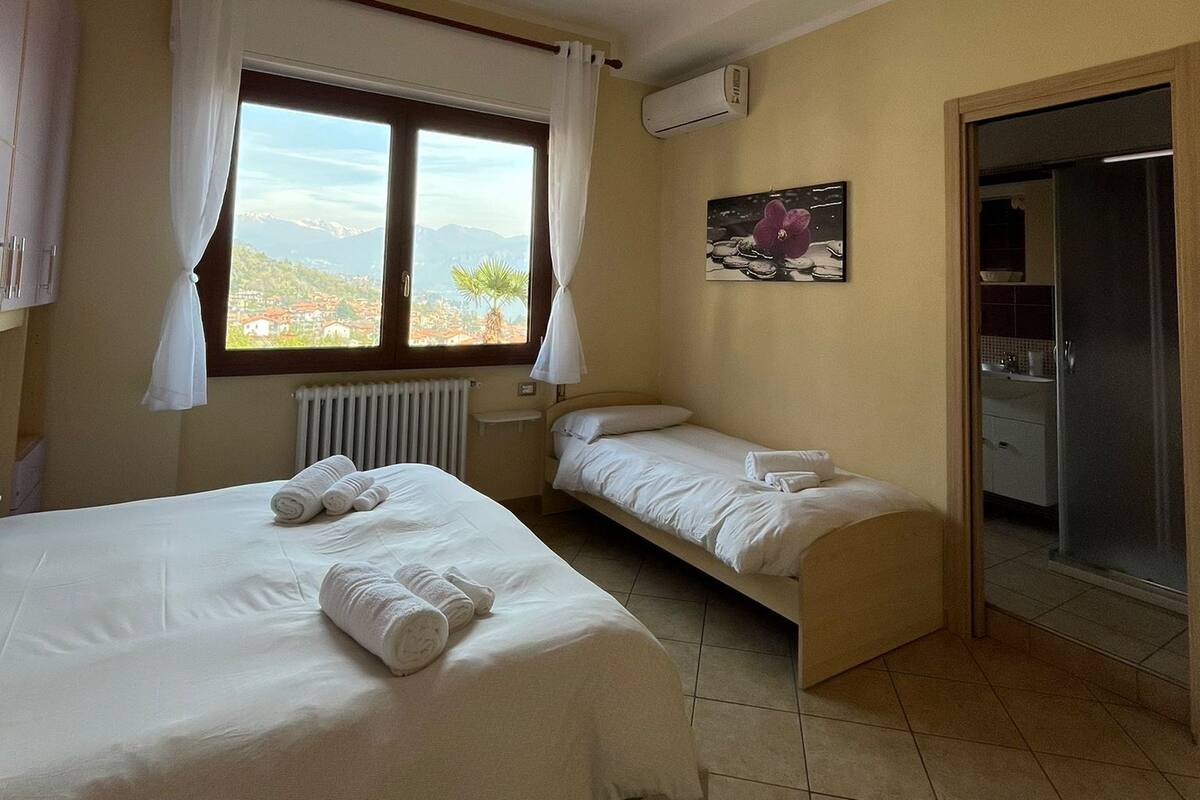 Triple Room, Lake View | Iron/ironing board, free WiFi